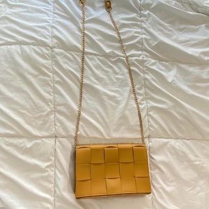 yellow woven crossbody bag
